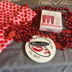 Mardi Gras! Gift Femme Fatale Mardi Gras beads,lip gloss and sweethearts bag.